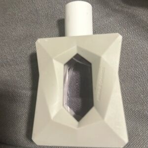 Ariana Grande-God is a woman. 3.4 fl ounces. Sprayed twice.